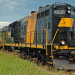 GP9 Locomotive No. 7438 makes its way through the country side.